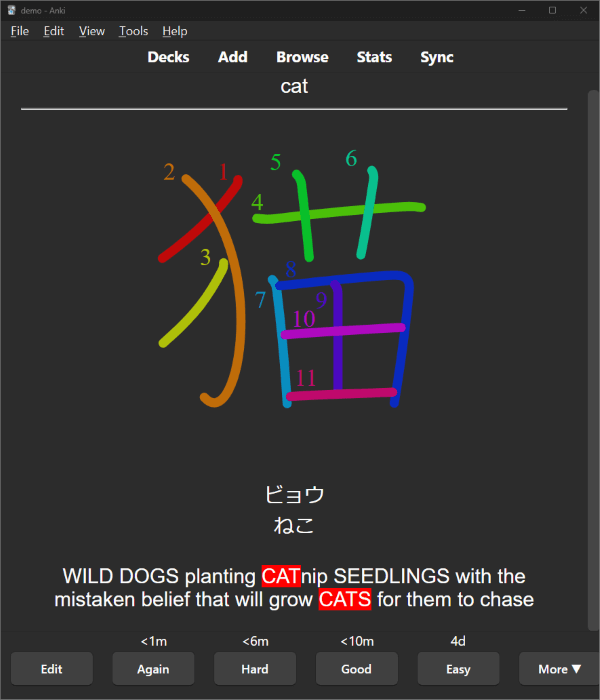 Back of the card showing the colorful kanji stroke order diagram, the onyomi and kunyomi readings, and the mnemonic