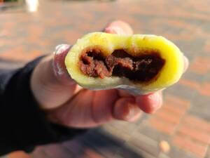 Yellowish green daifuku with red bean paste and chestnut inside