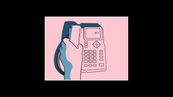 Top view of a phone with 911 entered into the screen and the player character's hand on the receiver