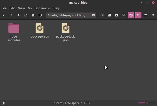 Folder "my cool blog" with subdirectory "node_modules" and two files named package.json and package-lock.json)