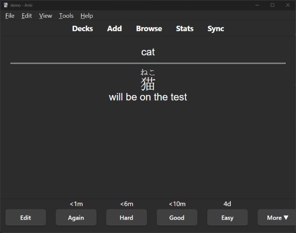 Anki card with "cat" in English at the top, followed by the kanji and furigana, and underneath that the note "will be on the test"