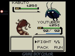 YOUTUBER facing off against Kabuto, which looks like a green-blue cockroach with long antennae