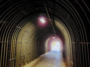 The inside of the tunnel lined with metal