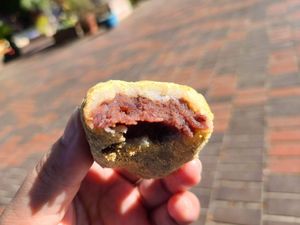 Kinako ogahi with brown powdery outside, white rice and red bean paste inside