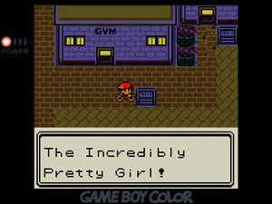 Player reading the sign outside of Goldenrod City's gym about the leader Whitney, 'The Incredibly Pretty Girl!'